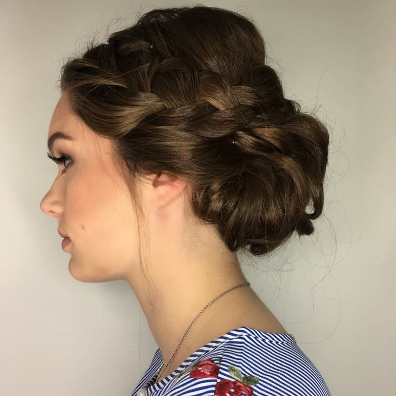 Braided bridal updo with a soft twisted chignon, by Hello Beauty Lounge in Red Deer